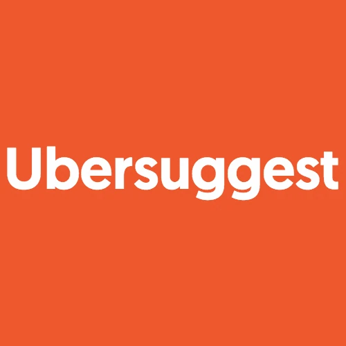 Ubersuggest SEO tool dashboard showing keyword data on a laptop
